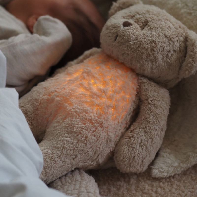 Moonie - Peluche con luz y música natural orgánica, osito