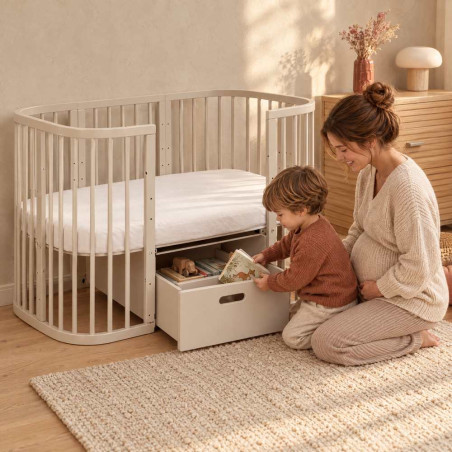 Cajón de almacenaje con ruedas para cuna cama evolutiva